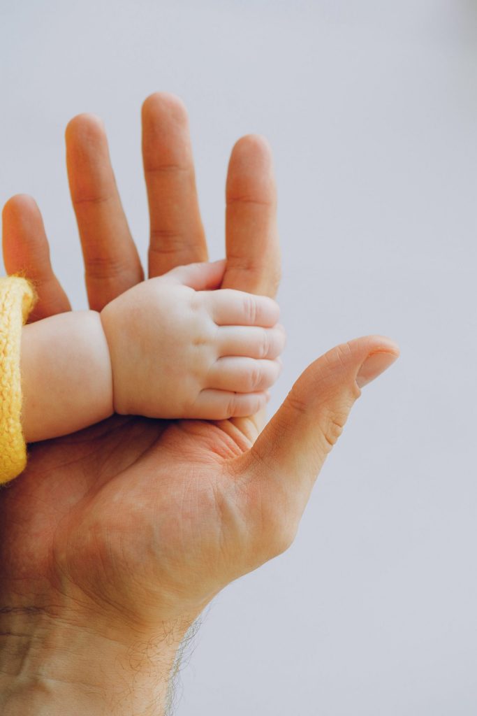 Looking after yourself. Photo of a child holding an adult's hand